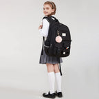 Lucia Large Black Laptop Backpack for College with Pom-Pom Charm and Luggage Strap