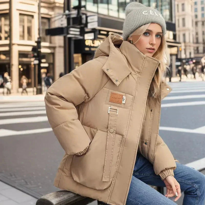 Hainie Women’s Waterproof Puffer Jacket – Oversized Winter Coat with Hood & High Collar